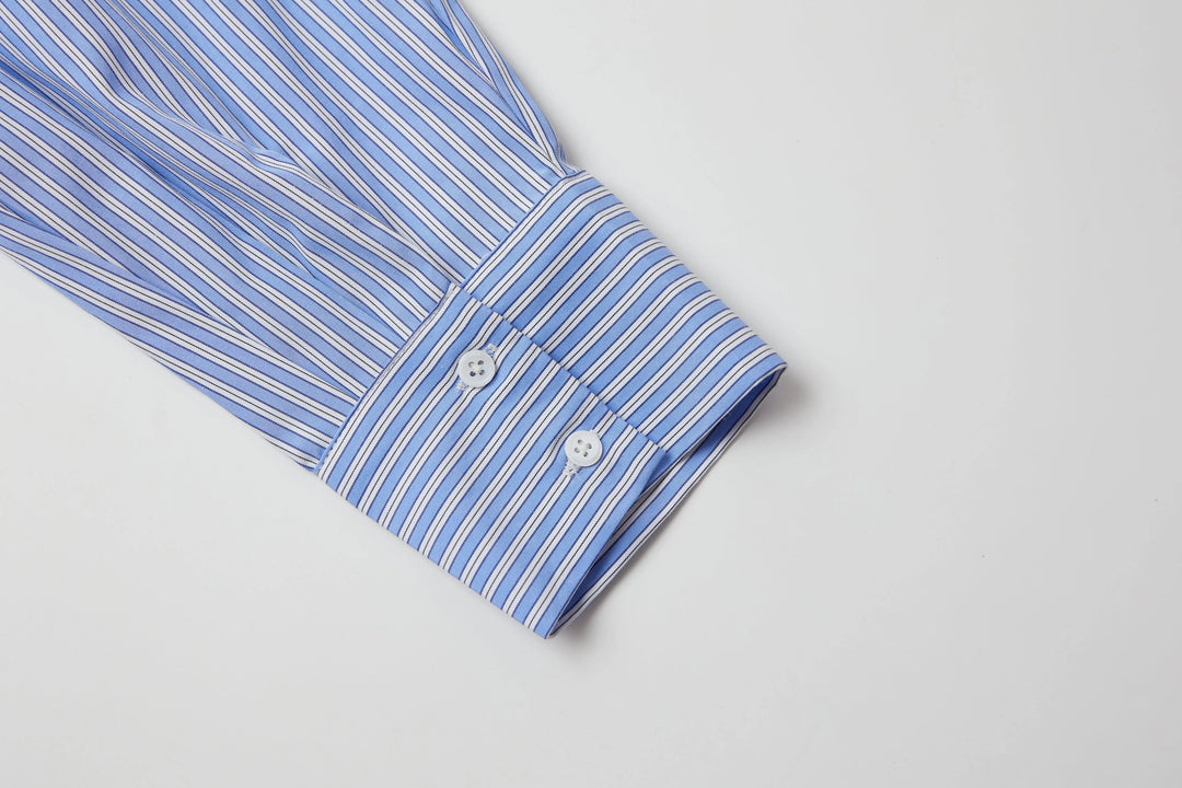 An image of a   BL5Z0M6 Cropped and Tucked Shirt by  Mirra Masa