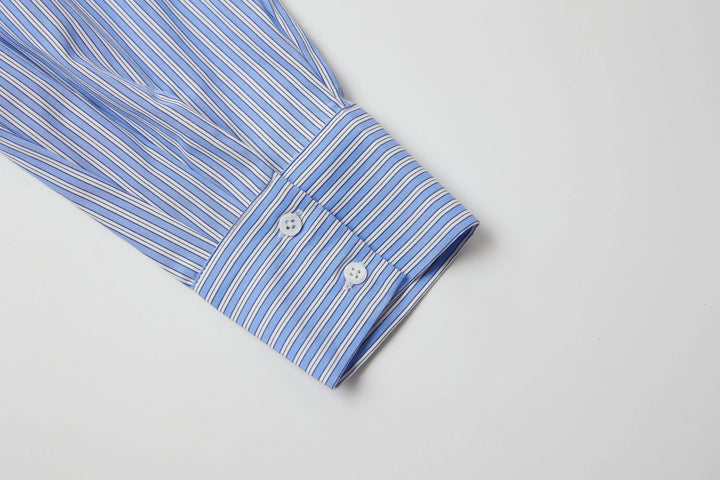 An image of a   BL5Z0M6 Cropped and Tucked Shirt by  Mirra Masa