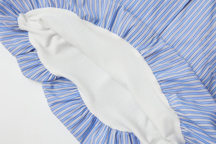 An image of a   BL5Z0M6 Cropped and Tucked Shirt by  Mirra Masa