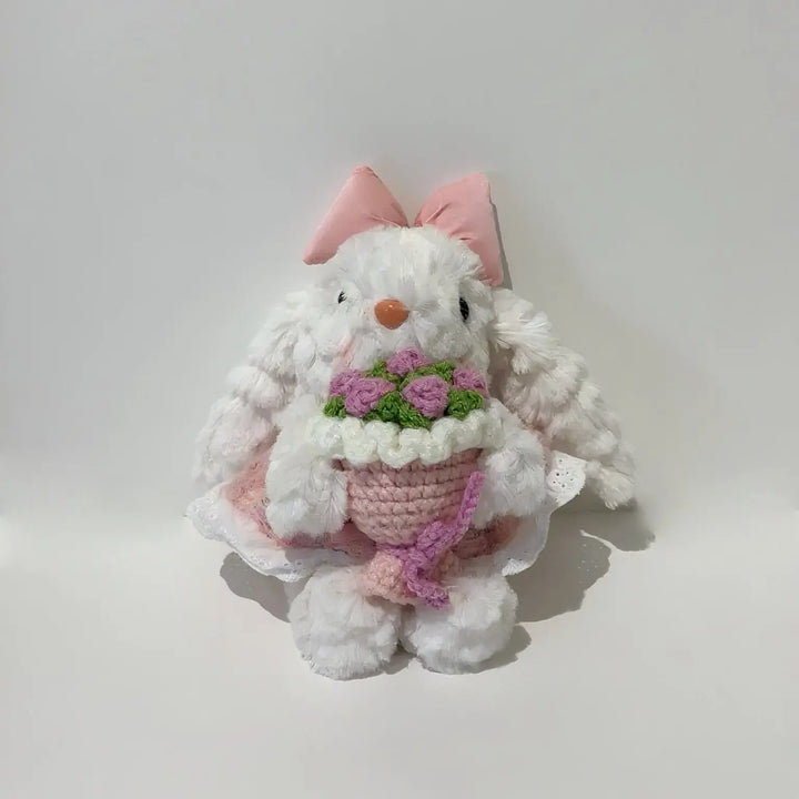 An image of a   Blossom Bow Bunny Bag & Key Charm by  Mirra Masa