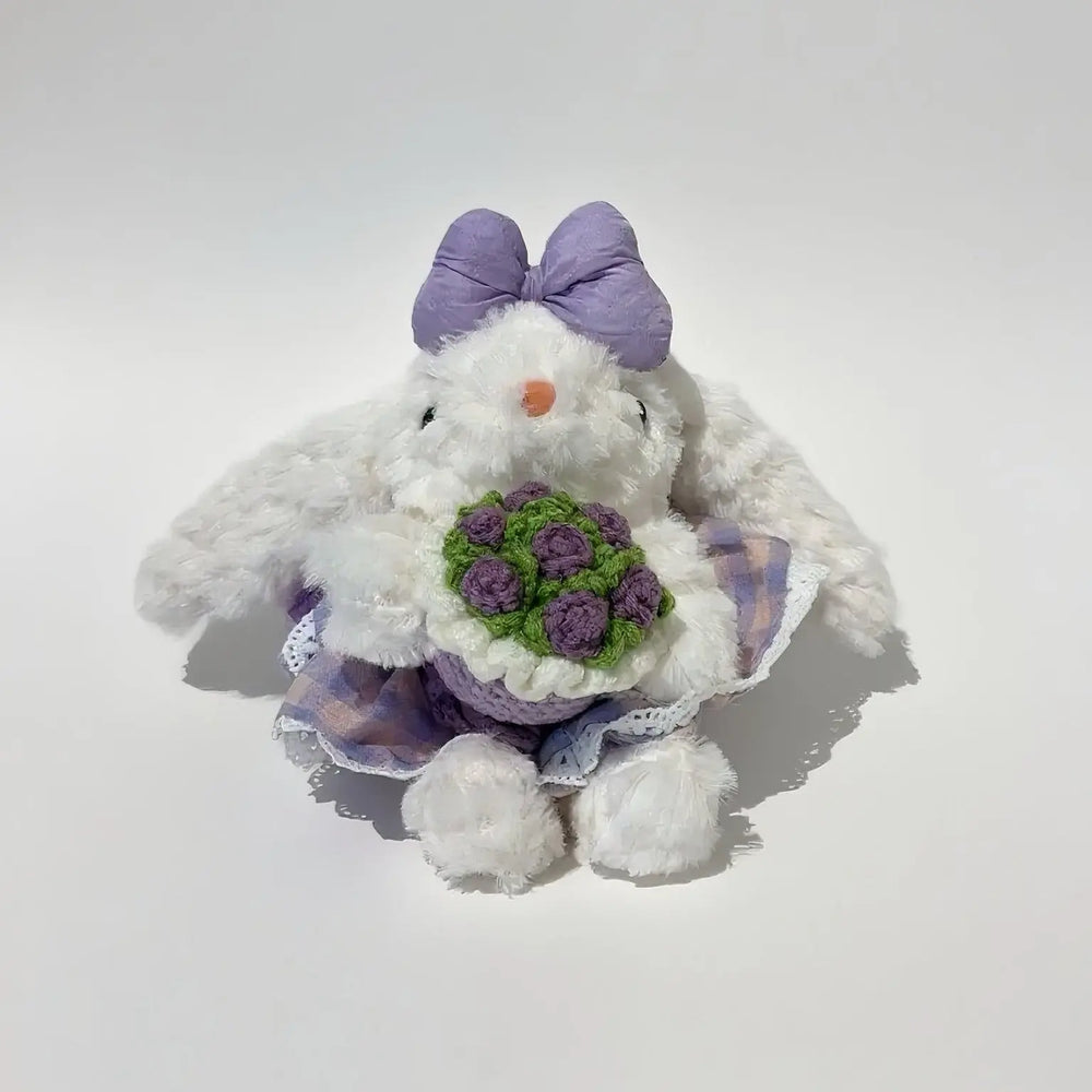 An image of a   Blossom Bow Bunny Bag & Key Charm by  Mirra Masa
