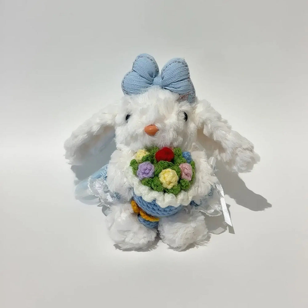 An image of a   Blossom Bow Bunny Bag & Key Charm by  Mirra Masa