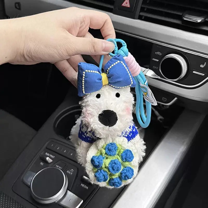 An image of a  Vintage Blue Bouquet Bow Puppy Bag & Key Charm by  Mirra Masa