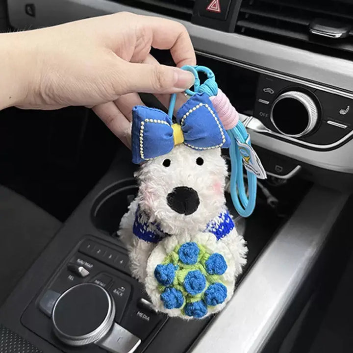 An image of a  Vintage Blue Bouquet Bow Puppy Bag & Key Charm by  Mirra Masa