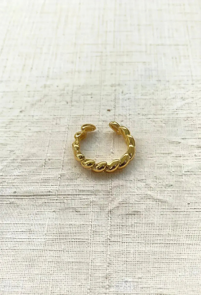 An image of a   Braided Dome Ring Adjustable by  Mirra Masa