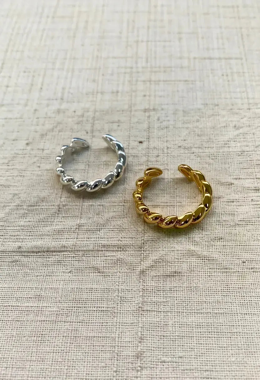 An image of a   Braided Dome Ring Adjustable by  Mirra Masa