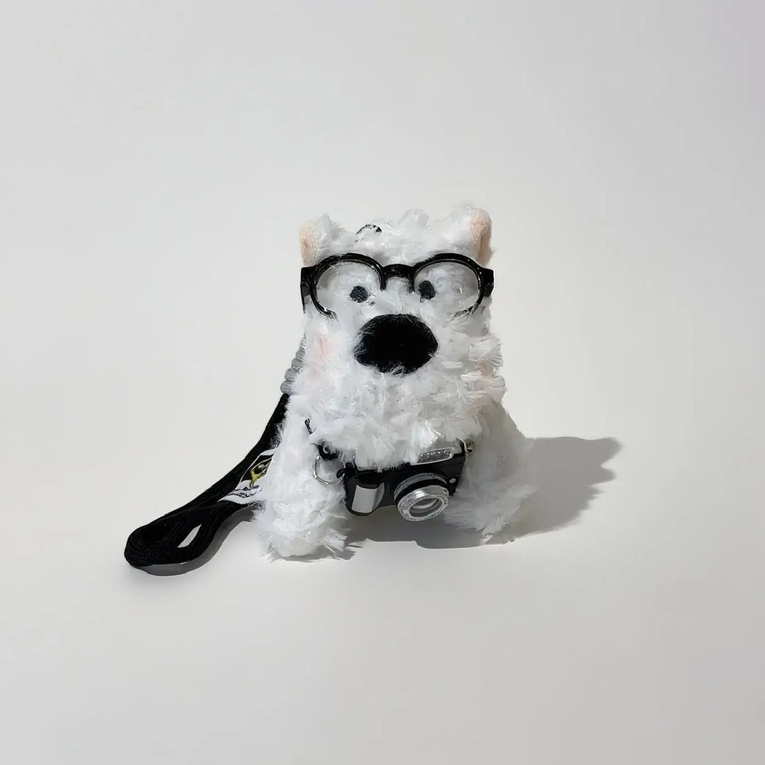 An image of a   Camera Pup Plush Bag & Key Charm by  Mirra Masa