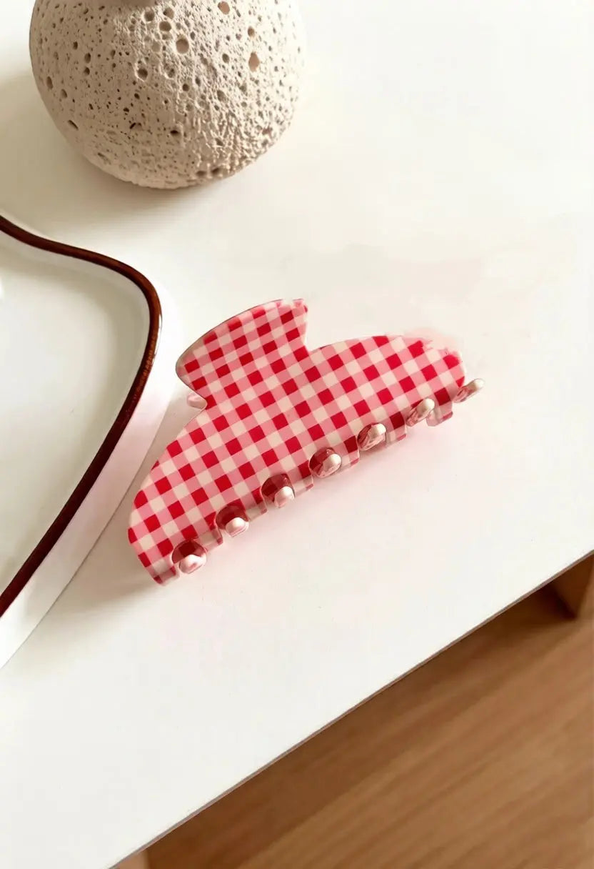 An image of a   Checkered Fan Hair Claw Large by  Mirra Masa