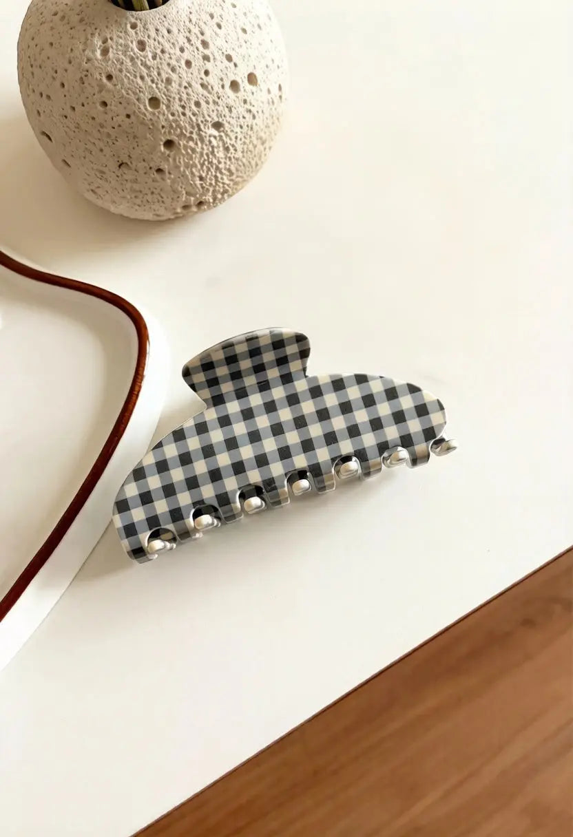 An image of a   Checkered Fan Hair Claw Large by  Mirra Masa