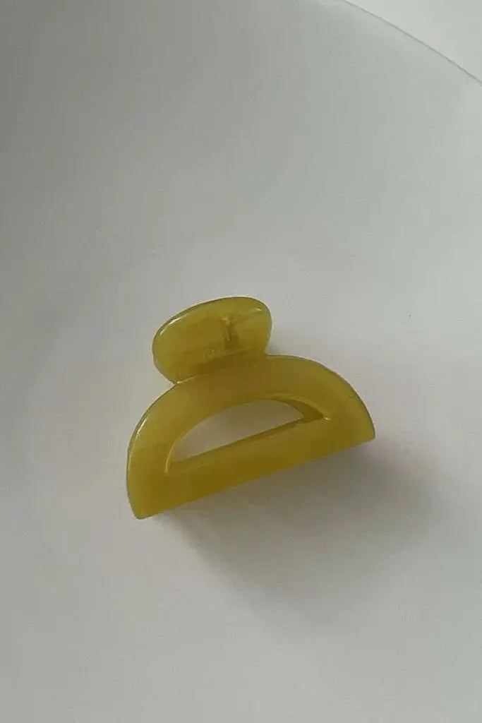 An image of a   Cutout Half-Moon Hair Claw Small by  Mirra Masa