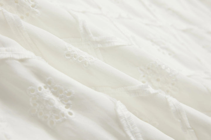 An image of a   DR31ZM6 Laced Slip Dress by  Mirra Masa