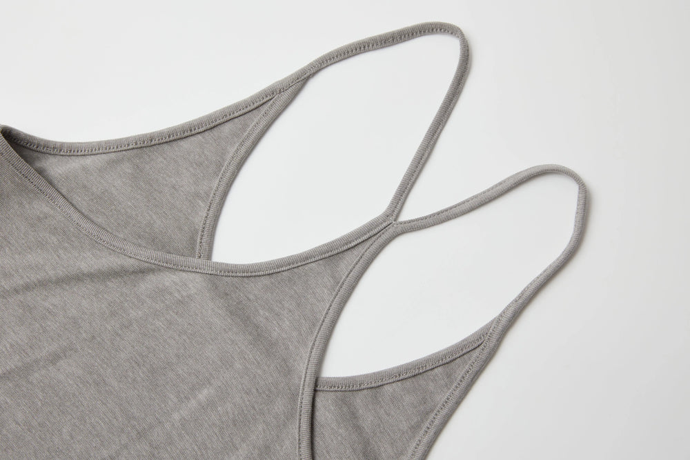 An image of a   DR4G3M6 Silhouette Slip Dress by  Mirra Masa