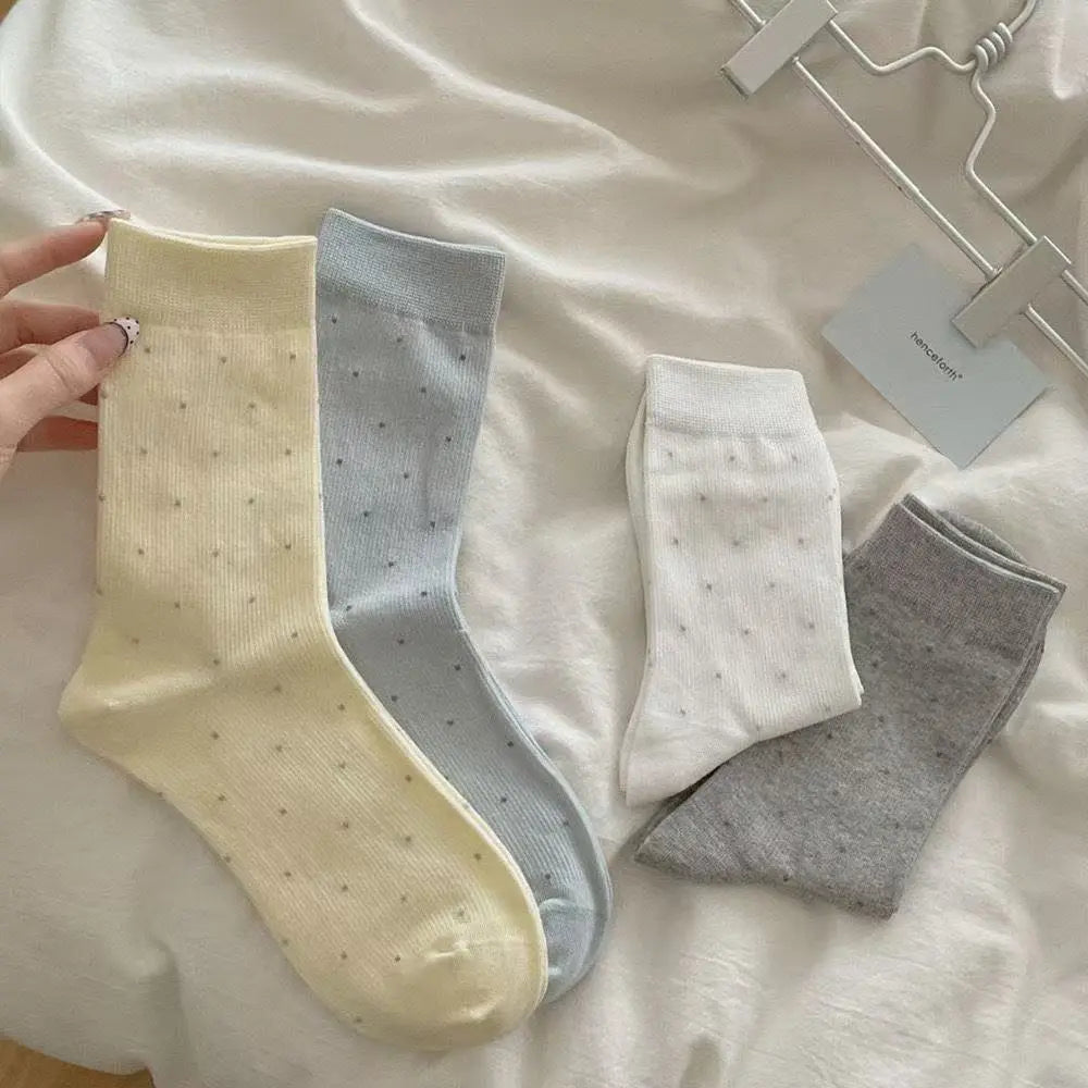 An image of a   Essential Pin-Dot Socks by  Mirra Masa