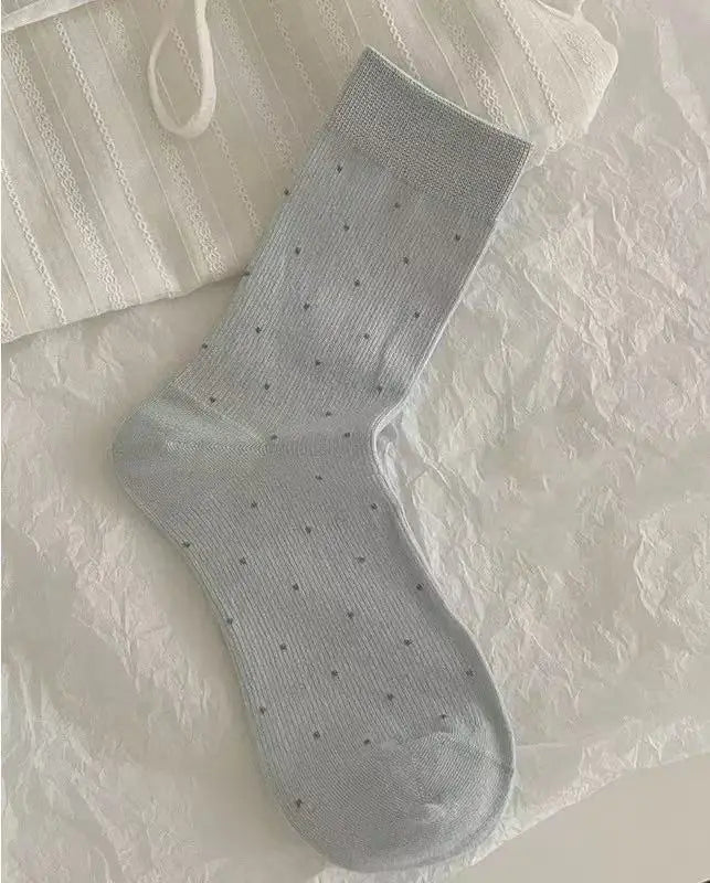 An image of a   Essential Pin-Dot Socks by  Mirra Masa