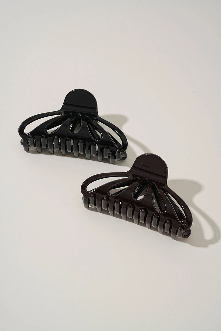 An image of a   Fan Glossy Cutout Hair Claws by  Mirra Masa