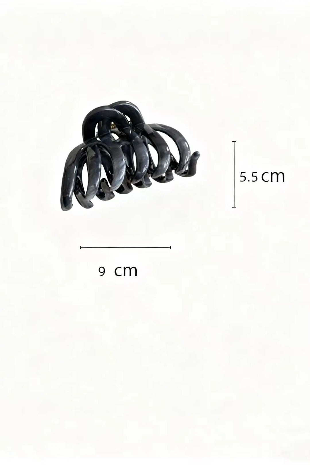 An image of a   Fan Glossy Twist Jumbo Hair Claws by  Mirra Masa