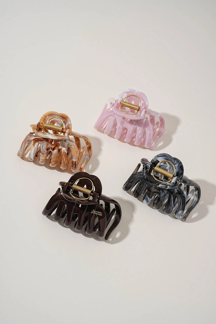 An image of a   Fan Glossy Twist Jumbo Hair Claws by  Mirra Masa