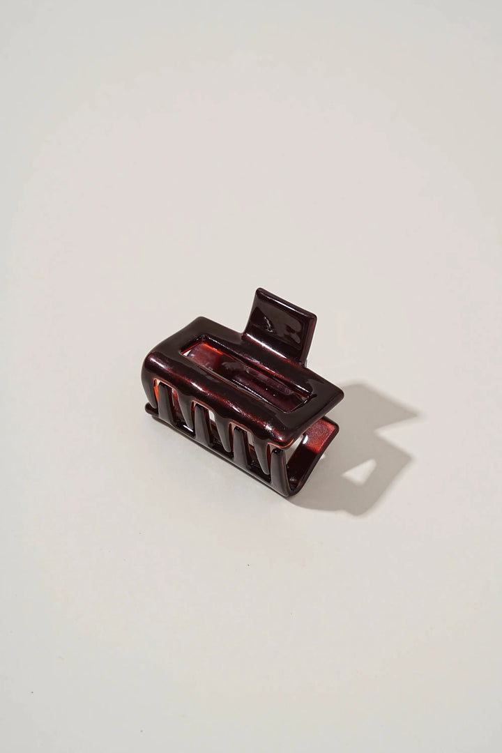 An image of a   Geo Glossy Classic Hair Claws by  Mirra Masa