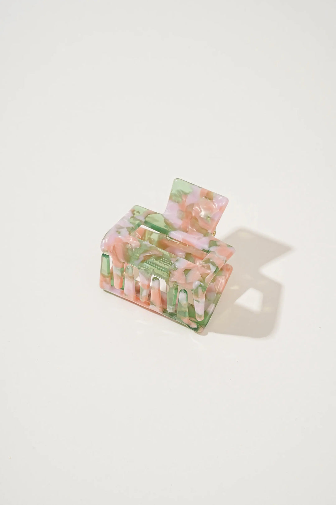 An image of a   Glossy Marbled Geo Claw by  Mirra Masa