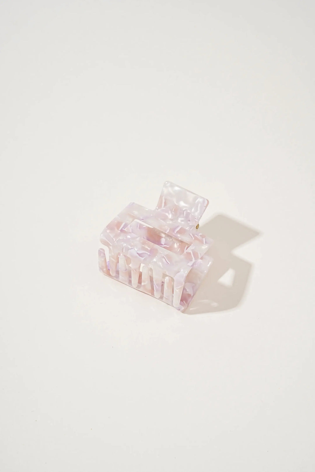 An image of a   Glossy Marbled Geo Claw by  Mirra Masa