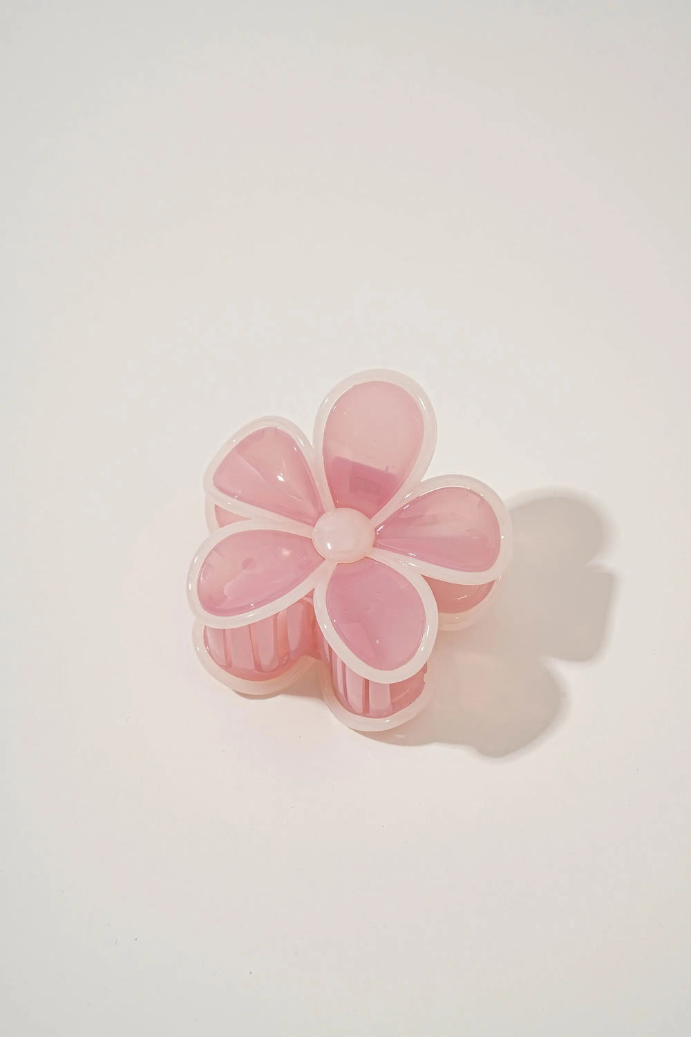 An image of a   Glossy Outlined Flower Hair Claw by  Mirra Masa