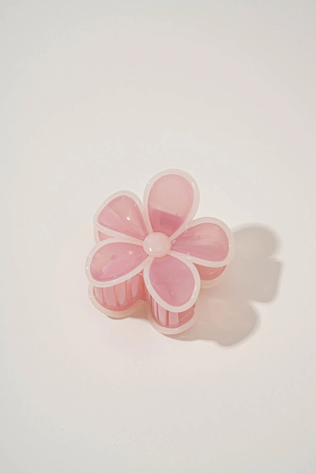 An image of a   Glossy Outlined Flower Hair Claw by  Mirra Masa