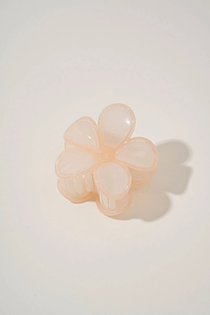 An image of a   Glossy Outlined Flower Hair Claw by  Mirra Masa