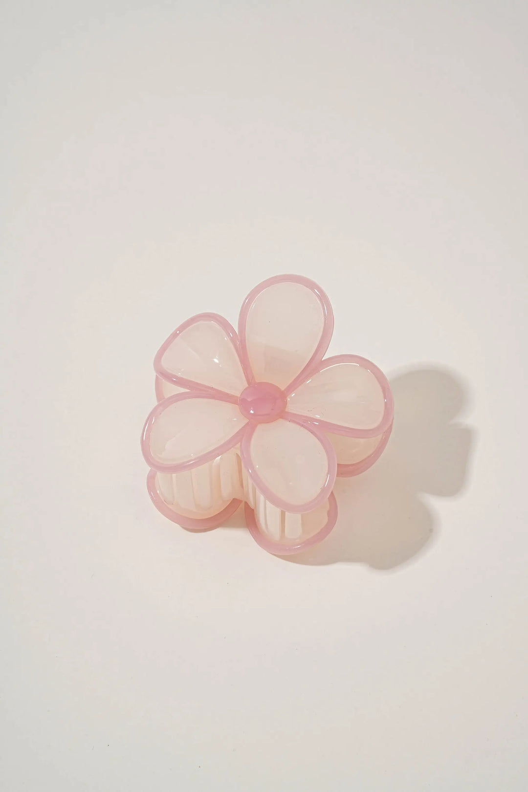 An image of a   Glossy Outlined Flower Hair Claw by  Mirra Masa