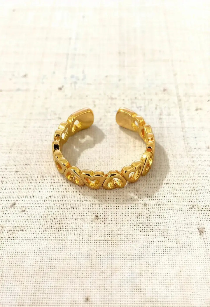 An image of a   Heart Cutout Band Adjustable by  Mirra Masa
