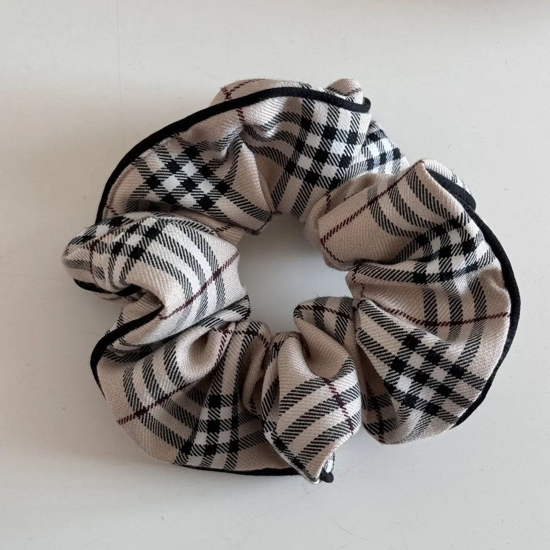 An image of a   Heritage Plaid Hair Set by  Mirra Masa