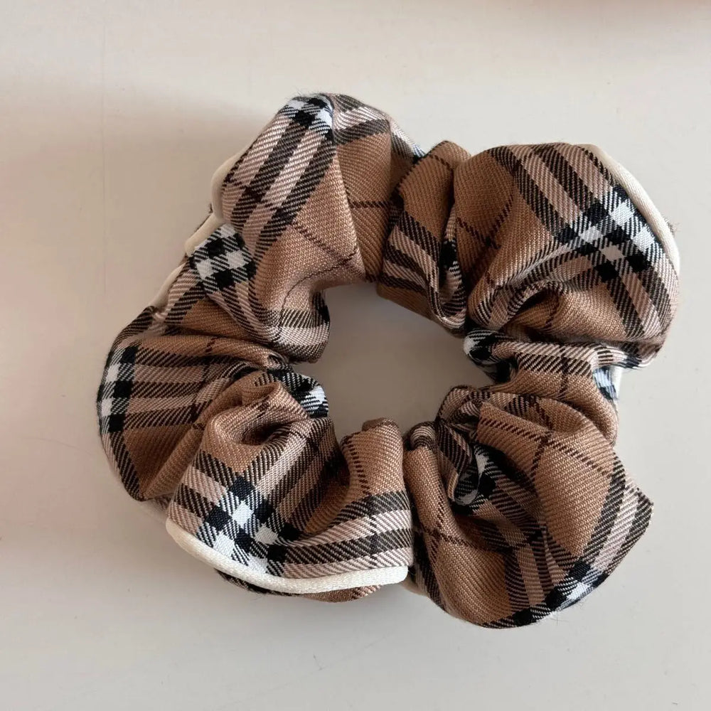 An image of a   Heritage Plaid Hair Set by  Mirra Masa