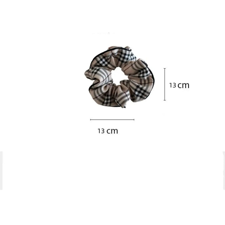 An image of a   Heritage Plaid Hair Set by  Mirra Masa