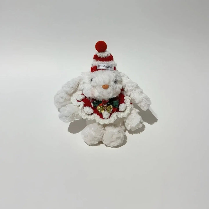 An image of a   HollyBun Holiday Bag & Key Charm by  Mirra Masa