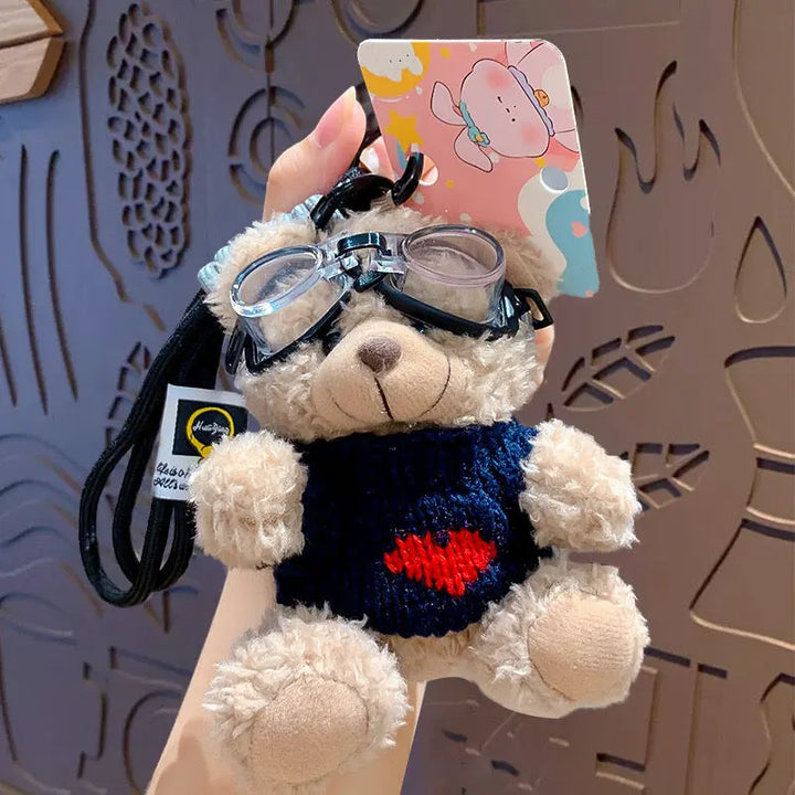 An image of a  Navy Knit Sweater Teddy Bear Bag & Key Charm by  Mirra Masa