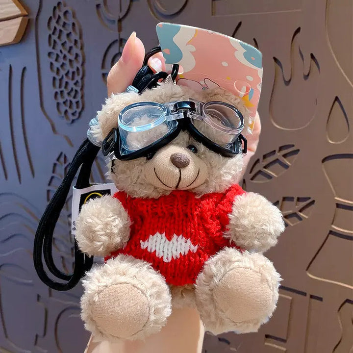 An image of a  Red Knit Sweater Teddy Bear Bag & Key Charm by  Mirra Masa