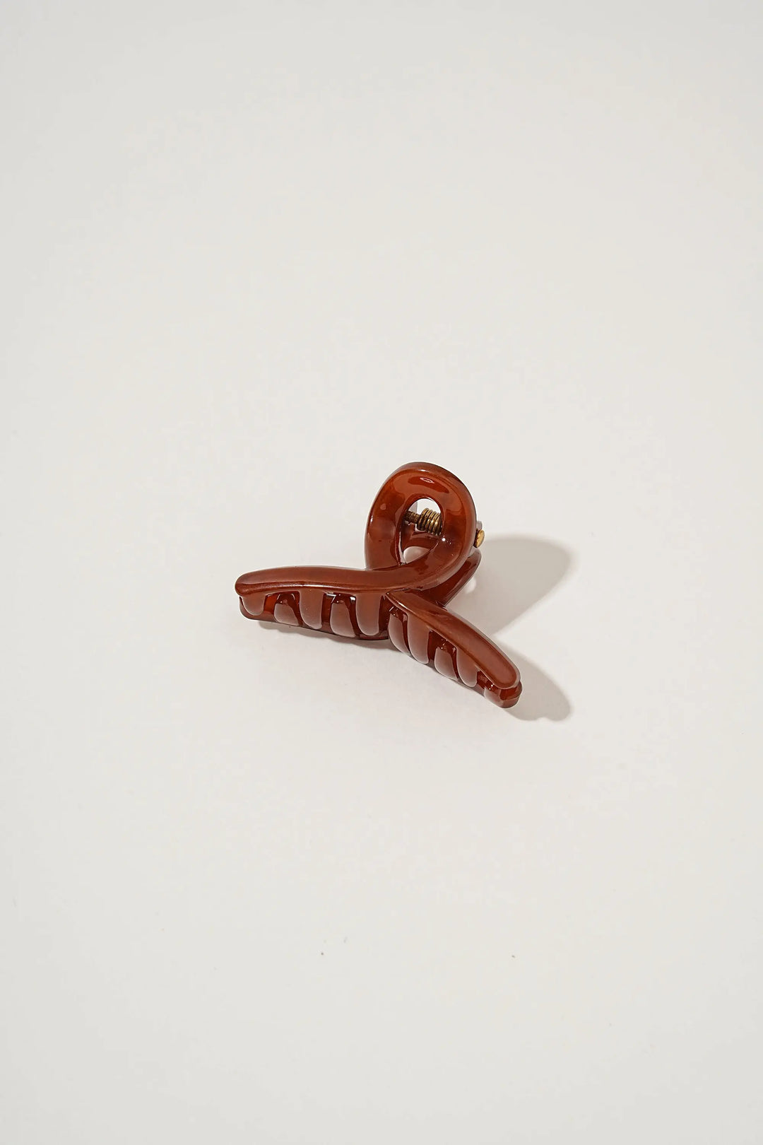 An image of a   Loop Glossy Mini Hair Claws by  Mirra Masa