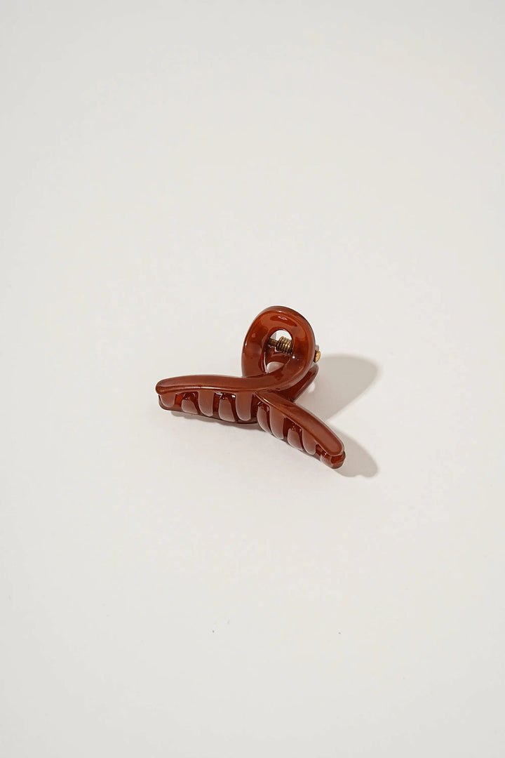 An image of a   Loop Glossy Mini Hair Claws by  Mirra Masa