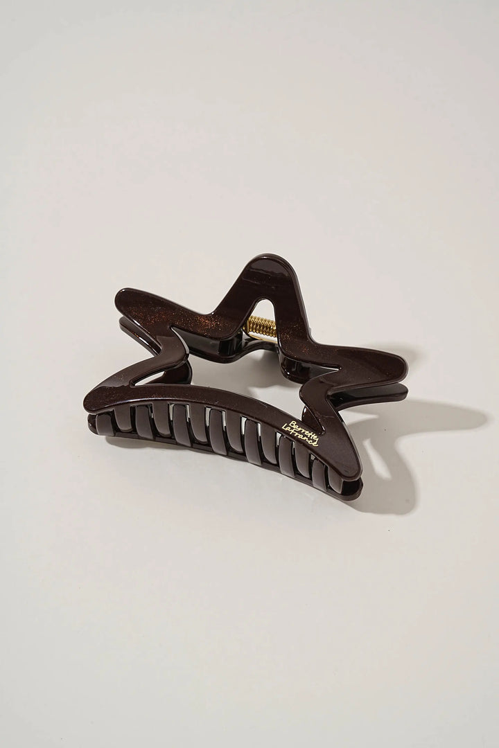 An image of a   Matte Cutout Star Claw by  Mirra Masa