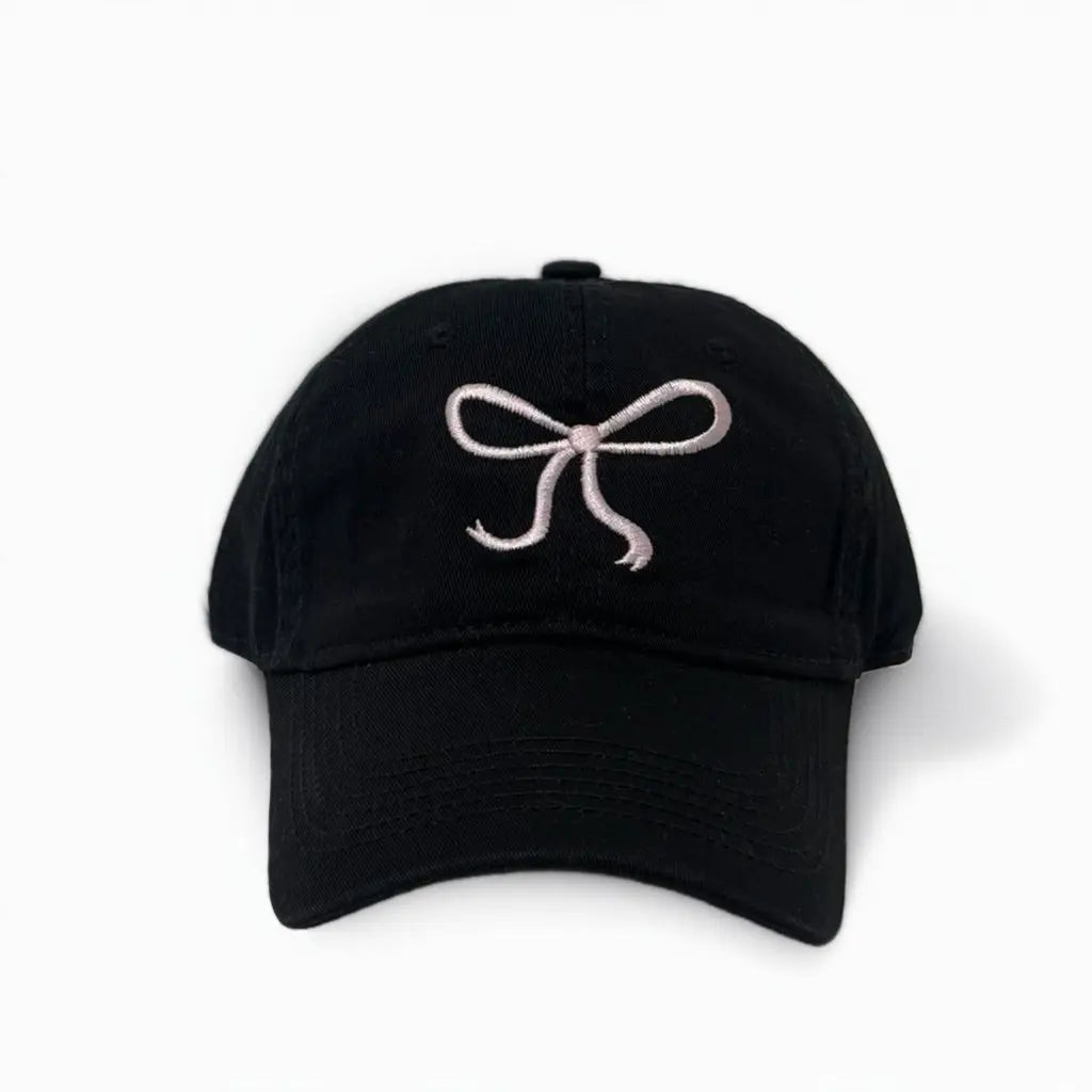 An image of a  Black Minimal Bow Stitch Cap by  Mirra Masa