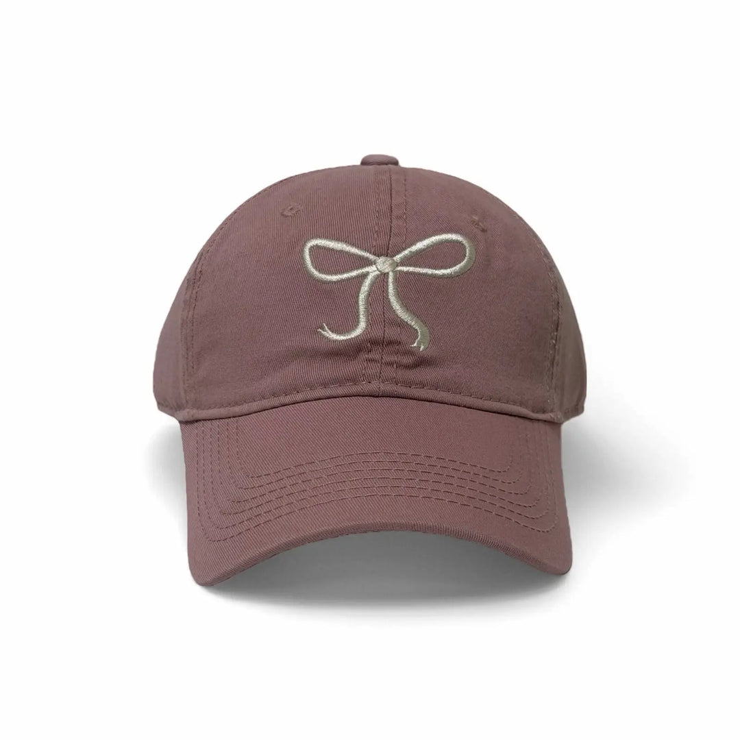 An image of a  Pink Minimal Bow Stitch Cap by  Mirra Masa