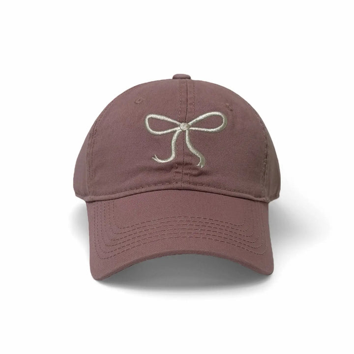 An image of a  Pink Minimal Bow Stitch Cap by  Mirra Masa