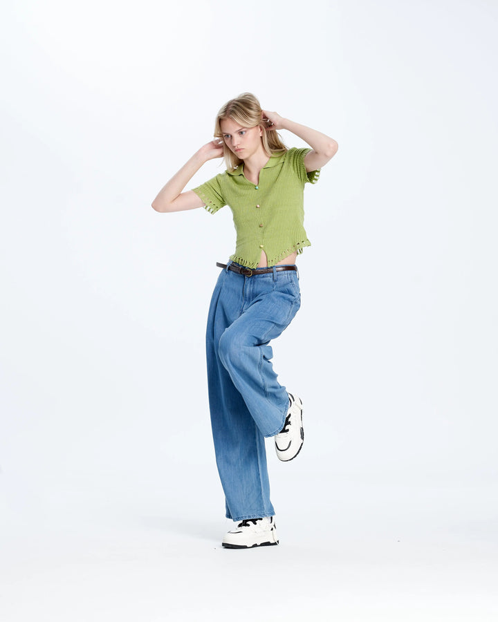 An image of a   N2D25 Cropped V-Neck Top by  Mirra Masa