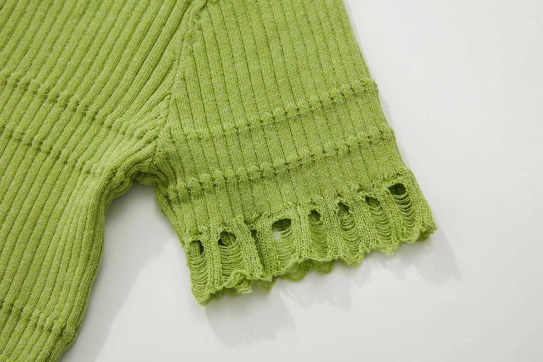 An image of a   N2D25 Cropped V-Neck Top by  Mirra Masa