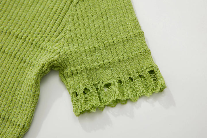 An image of a   N2D25 Cropped V-Neck Top by  Mirra Masa