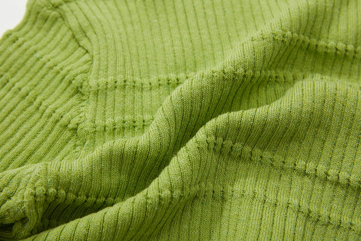 An image of a   N2D25 Cropped V-Neck Top by  Mirra Masa
