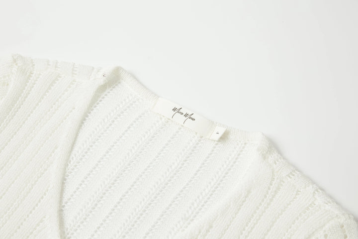An image of a   OW83US6 Knit Cardigan by  Mirra Masa