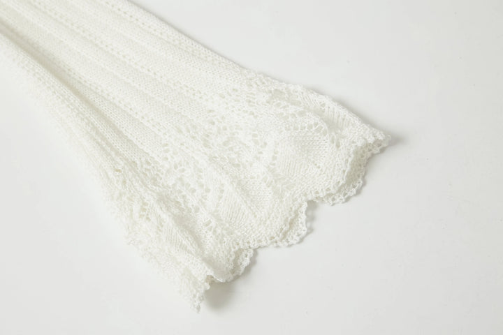 An image of a   OW83US6 Knit Cardigan by  Mirra Masa