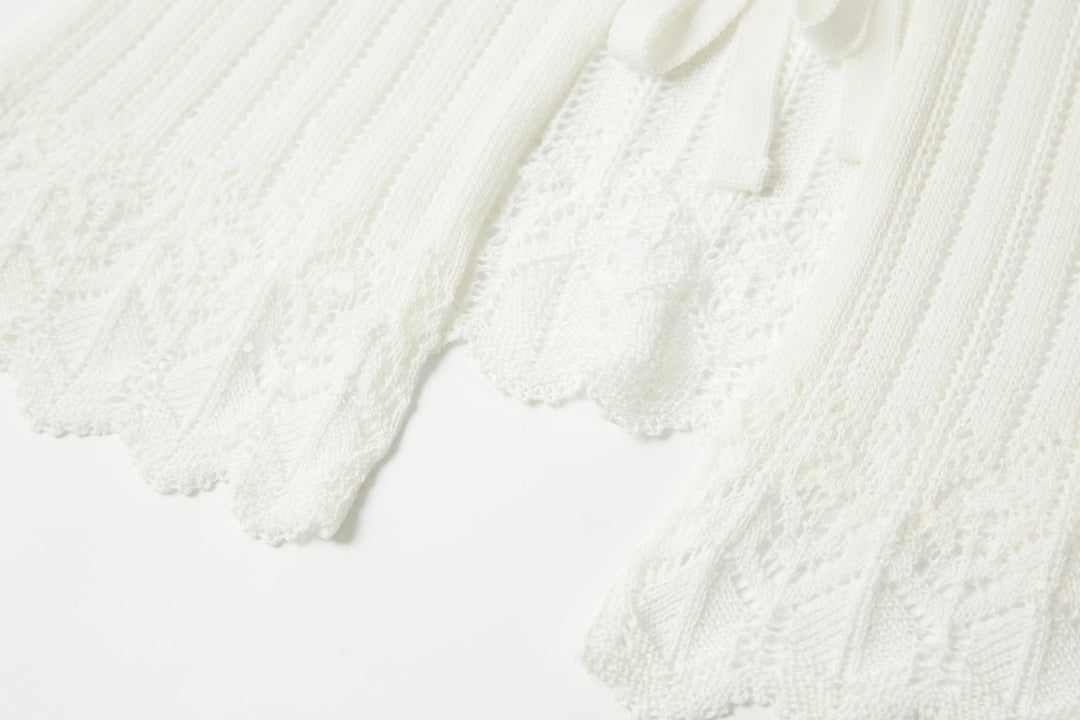 An image of a   OW83US6 Knit Cardigan by  Mirra Masa