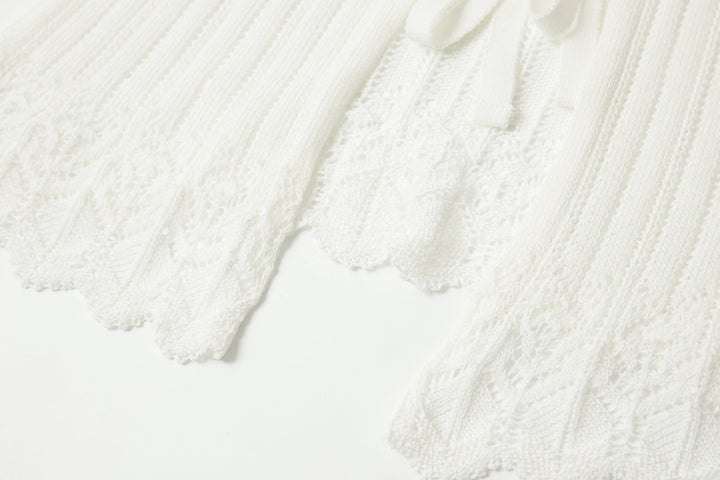 An image of a   OW83US6 Knit Cardigan by  Mirra Masa