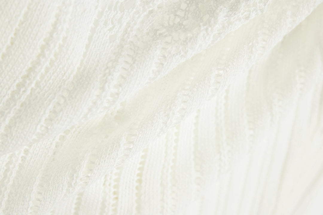 An image of a   OW83US6 Knit Cardigan by  Mirra Masa